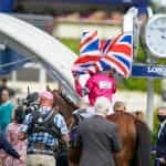 Nicola Currie celebrates after riding a winner at the 2021 Dubai Duty Free Shergar Cup. 